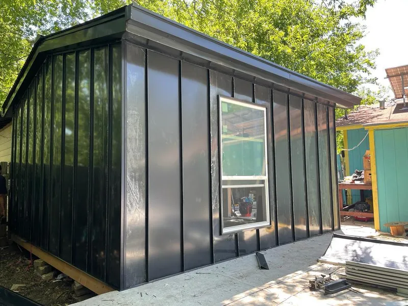 Black standing seam metal wall panels for Metal Roof Installation in Cambridge